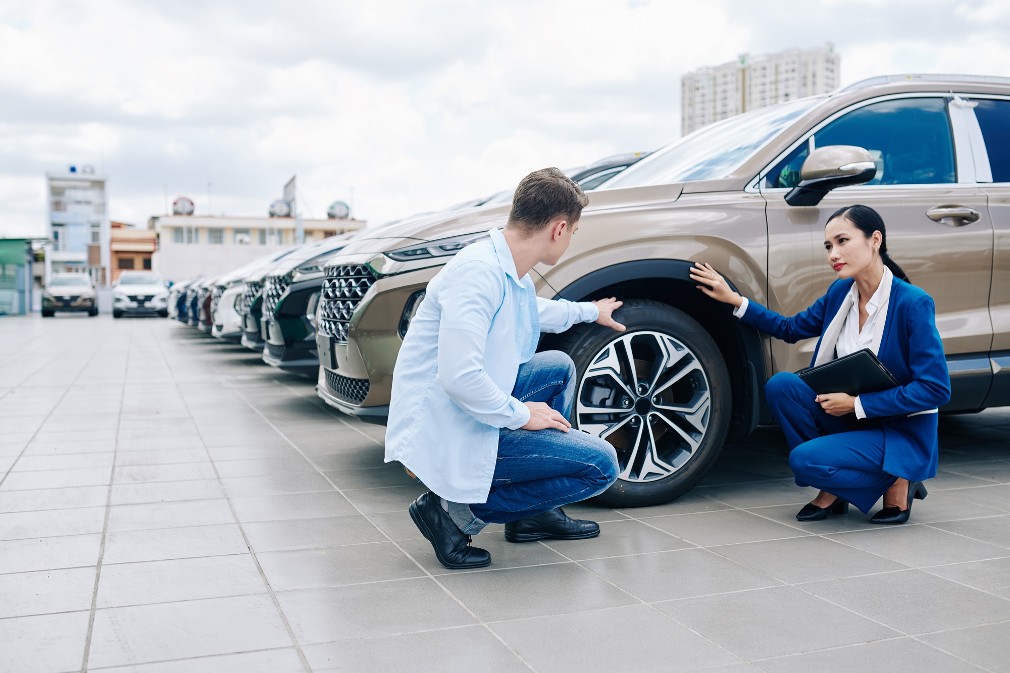 Cutomer checking car tires